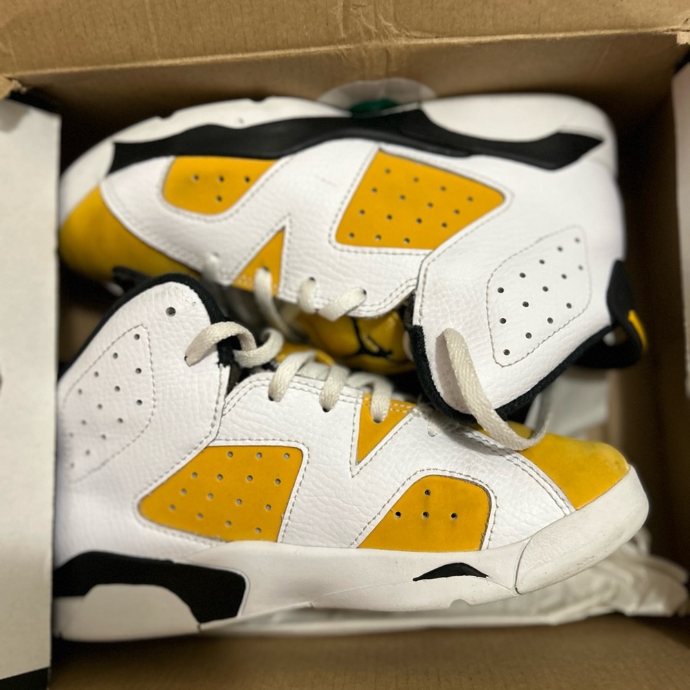 Jordan White and Yellow Retro Sneakers Athletic Design